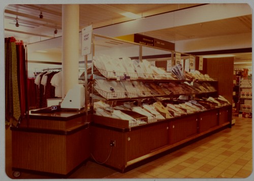 SA/BRA/7/C/4/3/424 - Image of Cambridge Coldhams Lane store interior: clothing department - wrap point and shirts display