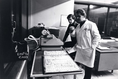 SA/DEP/4/6/43 - Photograph of Charlton Depot, 1977 - employees and adding machine
