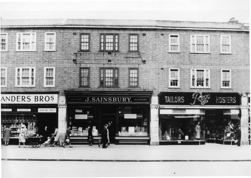 SA/WAR/2/IMA/1/2 - Photograph of unknown branch exterior with rationing window advertisements